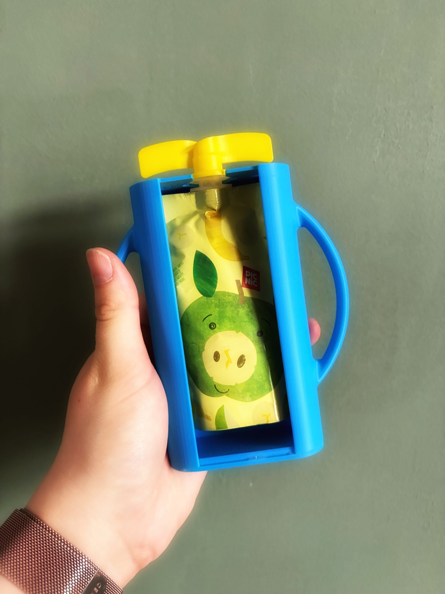 Knijpfruit houder